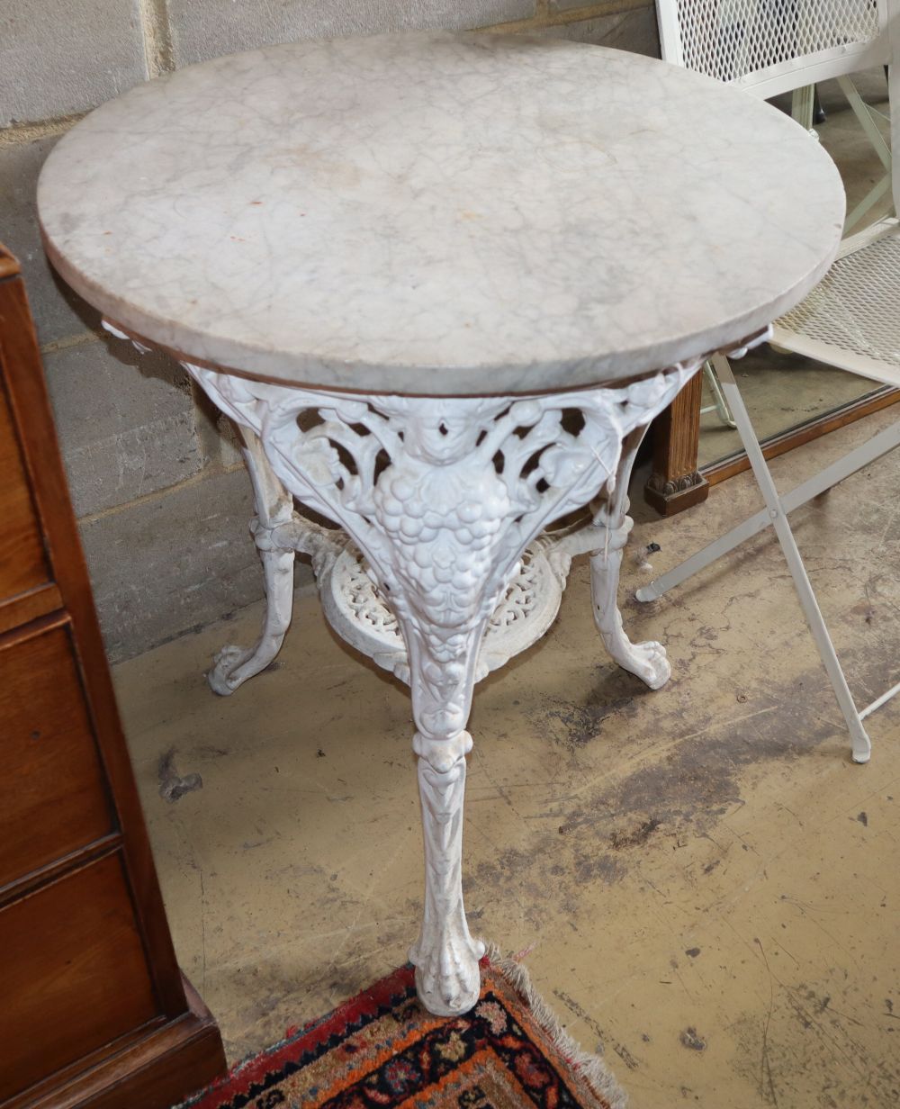 A Victorian painted cast iron circular marble top table, W.66cm, H.74cm